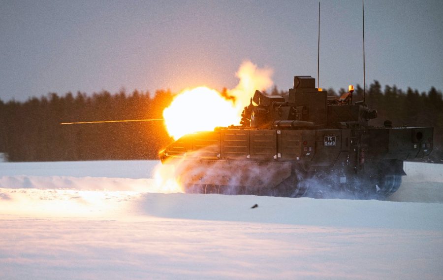 The Ajax firing and moving in extreme weather conditions in Sweden. MOD Crown Copyright 2024.