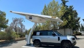 Image: Vehicle being charged at a BEAM Global solar charging point. MOD Crown Copyright