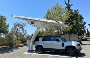 Image: Vehicle being charged at a BEAM Global solar charging point. MOD Crown Copyright